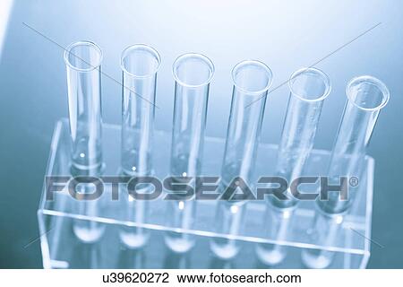 Empty tubes in a test tube rack. View Large Photo Image Stock Image - Empty tubes in a test tube rack.. Fotosearch