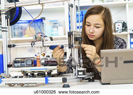 Female electronics student in laboratory View Large Photo Image Stock Photograph - Female electronics student in laboratory. Fotosearch