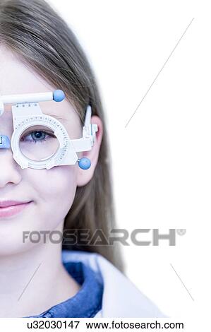 Girl wearing trial frame View Large Photo Image Stock Photo - Girl wearing trial frame. Fotosearch