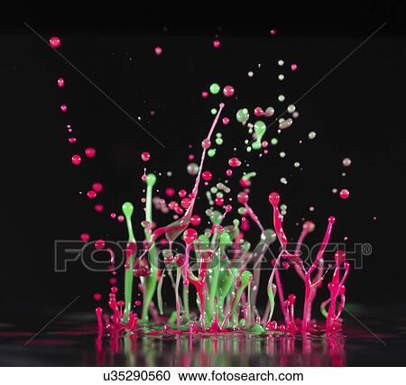 Green and red splashes against a black background, View Large Photo Image Stock Image - Green and red splashes against a black background,. Fotosearch