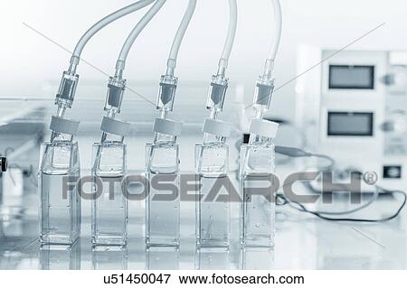 Stock Photo - Laboratory bottles and tubes, close up.. Fotosearch