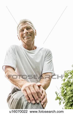 Man smiling towards camera, portrait View Large Photo Image Stock Image - Man smiling towards camera, portrait. Fotosearch