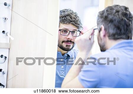 Man wearing glasses View Large Photo Image Stock Photo - Man wearing glasses. Fotosearch