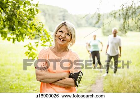 Mature woman resting after exercise View Large Photo Image Stock Photograph - Mature woman resting after exercise. Fotosearch