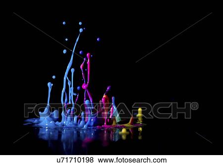 Stock Photo - Multicoloured splashes against a black background,. Fotosearch