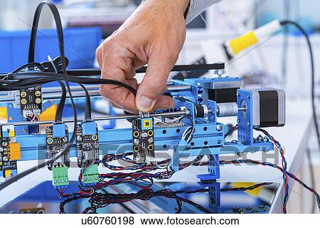Person working in electronics laboratory. View Large Photo Image Stock Photo - Person working in electronics laboratory.. Fotosearch