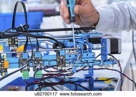 Person working in electronics laboratory. View Large Photo Image Stock Photo - Person working in electronics laboratory.. Fotosearch