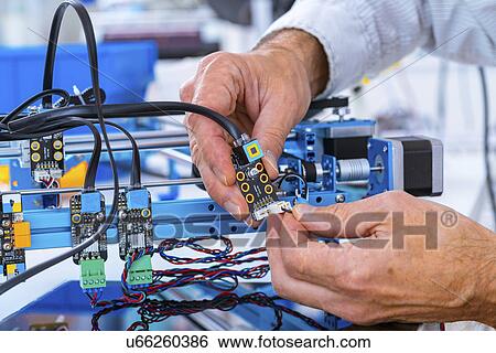 Person working in electronics laboratory. View Large Photo Image Stock Photograph - Person working in electronics laboratory.. Fotosearch