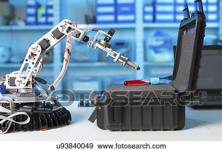 Robotic arm and test tube in the laboratory. View Large Photo Image Stock Photo - Robotic arm and test tube in the laboratory.. Fotosearch