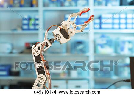 Robotic arm in the laboratory. View Large Photo Image Picture - Robotic arm in the laboratory.. Fotosearch