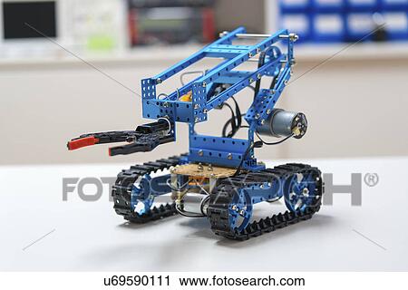 Stock Image - Robotic arm on caterpillar tracks.. Fotosearch