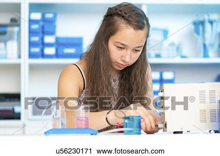 Science student working with pem proton exchange View Large Photo Image Stock Image - Science student working with pem proton exchange. Fotosearch
