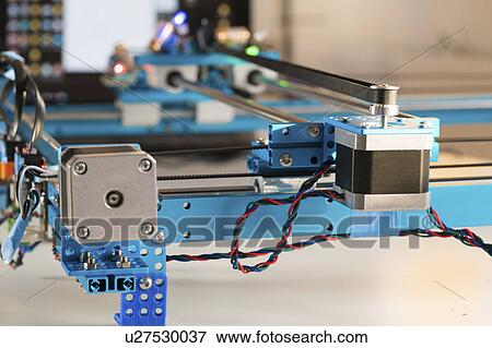 Stock Photo - Stepper motor on industrial machine.. Fotosearch