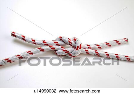 Stock Image - The Reef (Square) Knot on white background a Binder Knot It is easy tied and will not jam, so it is always easy to untie. Fotosearch