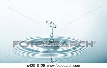 Stock Photo - Water droplet on water surface.. Fotosearch