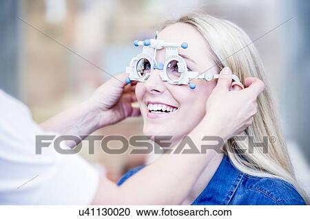 Woman having eye examination View Large Photo Image Stock Image - Woman having eye examination. Fotosearch