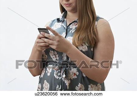 Woman using smartphone View Large Photo Image Stock Photograph - Woman using smartphone. Fotosearch