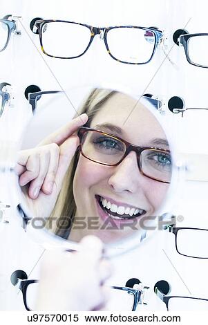 Stock Photography - Woman wearing glasses. Fotosearch
