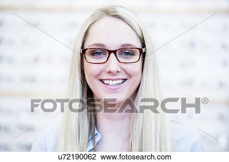 Woman with glasses View Large Photo Image Stock Image - Woman with glasses. Fotosearch