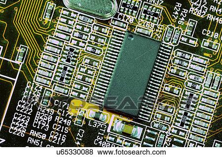Computer mother board with microchips and electrodes View Large Photo Image Stock Photo - Computer mother board with microchips and electrodes. Fotosearch