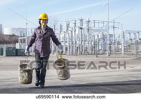 Female engineer working at power plant View Large Photo Image Picture - Female engineer working at power plant. Fotosearch