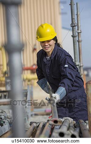 Female engineer working at power plant View Large Photo Image Stock Image - Female engineer working at power plant. Fotosearch