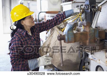 Female engineer working at power plant View Large Photo Image Stock Photo - Female engineer working at power plant. Fotosearch
