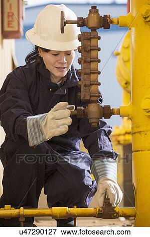 Female engineer working at power plant View Large Photo Image Stock Photo - Female engineer working at power plant. Fotosearch