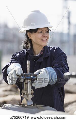 Female engineer working at power plant View Large Photo Image Stock Photo - Female engineer working at power plant. Fotosearch