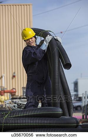 Female engineer working at power plant View Large Photo Image Stock Photograph - Female engineer working at power plant. Fotosearch