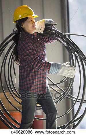 Female engineer working at power plant View Large Photo Image Stock Photograph - Female engineer working at power plant. Fotosearch