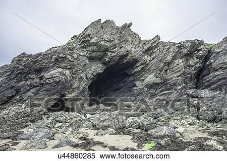 Stock Photography - Folded rock strata on Anglesey, Wales. Fotosearch