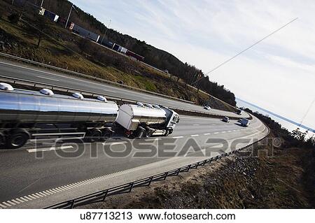 Stock Image - Fuel tanker truck on highway. Fotosearch