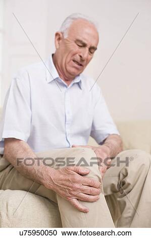 Man with knee pain View Large Photo Image Stock Image - Man with knee pain. Fotosearch