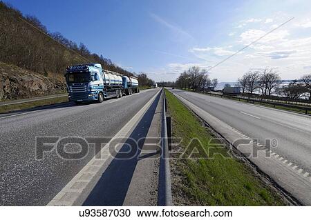 Oil and fuel truck driving on highway View Large Photo Image Stock Image - Oil and fuel truck driving on highway. Fotosearch