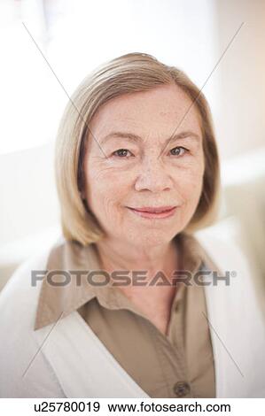 Stock Photo - Portrait of smiling woman. Fotosearch