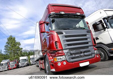 Trucks parked View Large Photo Image Stock Image - Trucks parked. Fotosearch