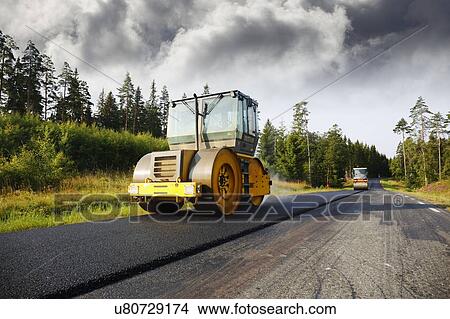 Picture - Asphalt and steamrollers. Fotosearch