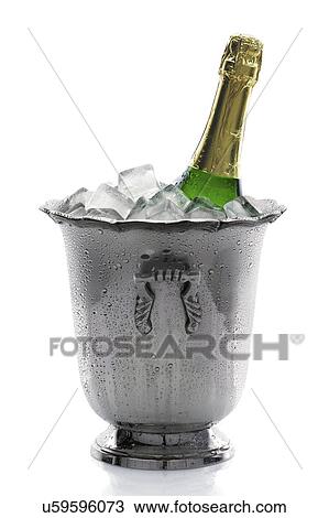 Champagne bottle in ice bucket, studio shot View Large Photo Image Stock Image - Champagne bottle in ice bucket, studio shot. Fotosearch