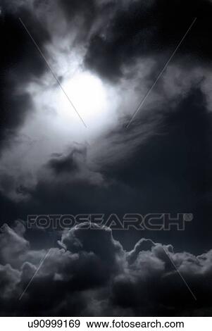 Clouds in dark sky View Large Photo Image Stock Photo - Clouds in dark sky. Fotosearch