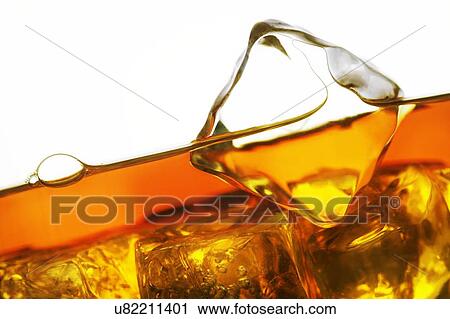 Drink with ice cubes View Large Photo Image Stock Image - Drink with ice cubes. Fotosearch
