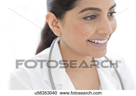 Female doctor smiling View Large Photo Image Stock Image - Female doctor smiling. Fotosearch