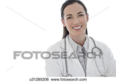 Stock Photograph - Female doctor smiling towards camera. Fotosearch