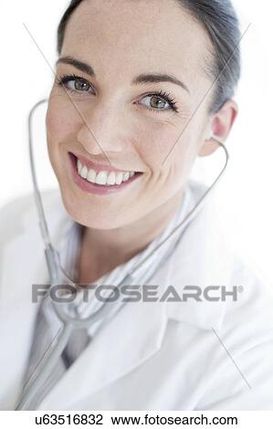 Female doctor wearing stethoscope View Large Photo Image Stock Image - Female doctor wearing stethoscope. Fotosearch