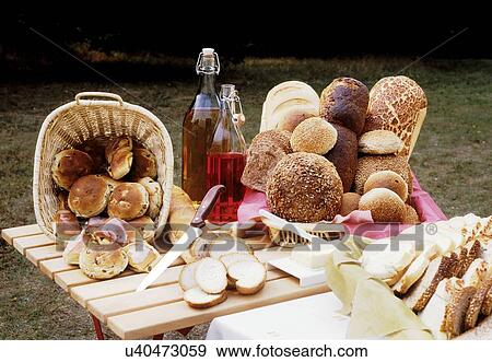 Fresh bread on picnic table View Large Photo Image Stock Photo - Fresh bread on picnic table. Fotosearch