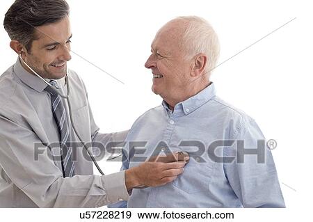 Stock Photo - Male doctor examining patient. Fotosearch