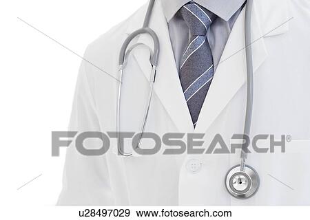 Male doctor wearing stethoscope View Large Photo Image Stock Photo - Male doctor wearing stethoscope. Fotosearch