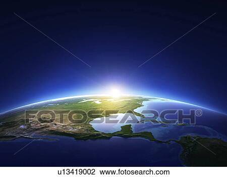 Planet earth at sunrise View Large Photo Image Stock Image - Planet earth at sunrise. Fotosearch