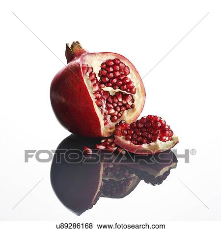 Stock Photo - Pomegranate against white background. Fotosearch