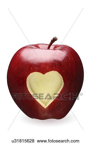 Stock Photo - Red apple with heart shape. Fotosearch